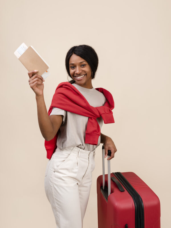 smiley-woman-with-red-baggage-medium-shot